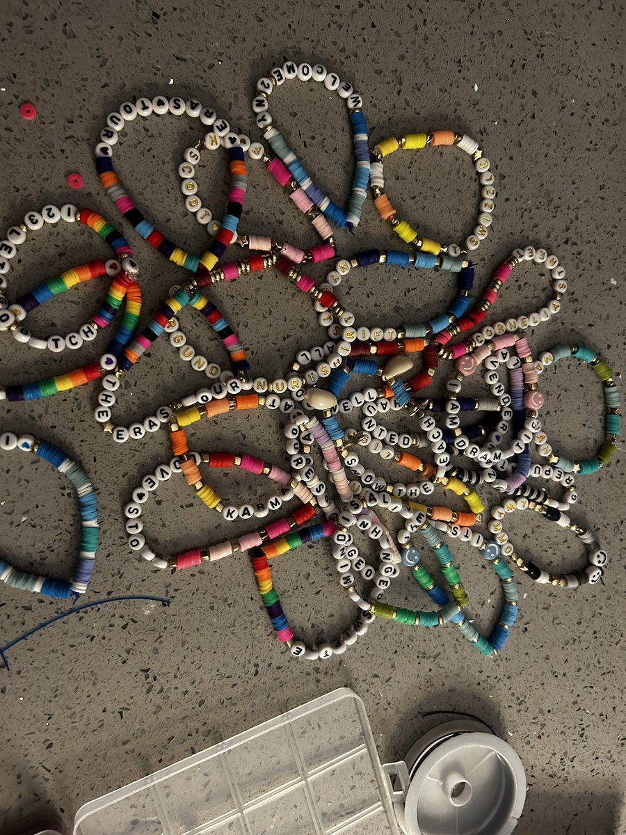 heyimdeej's tweet photo. @ErasTourResell a single ticket to metlife would mean everything to me 😭 it has been 13 years since i saw her live (it’s a sign!!) and will be planning to go solo. here are all the bracelets I have made so far! 🤍 https://t.co/qpeFiAytWM