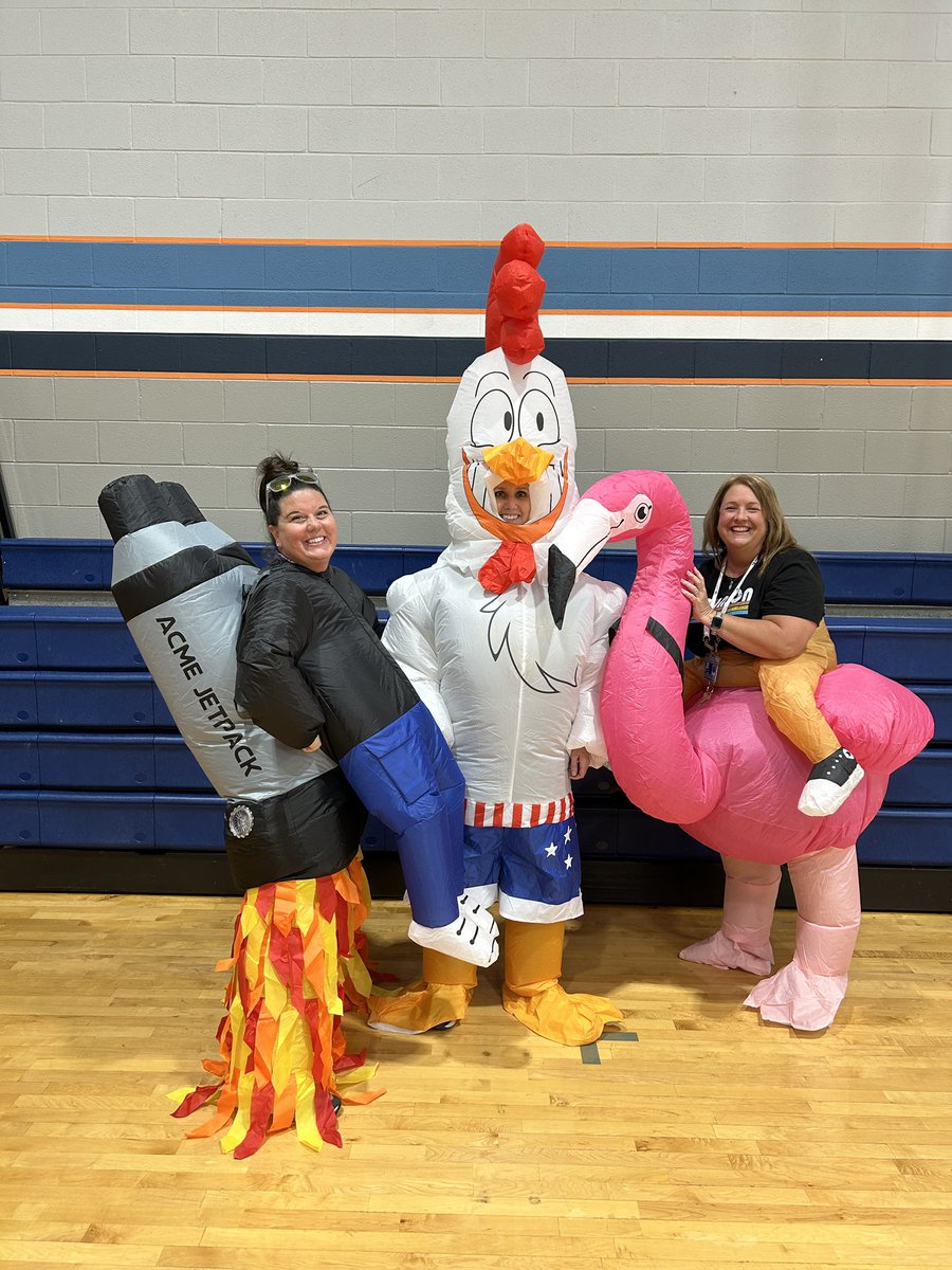 SJMSTigerPride's tweet photo. What’s better than your school principal dressing up as a flamingo 🦩 on the last day of school and bringing along her pet rooster 🐔 and a rocket 🚀 man?! 

Happy 💙Last 💙Day 💙SJMS TIGERS. We 🧡LOVE 🧡you! https://t.co/sNJ2dpMrxh