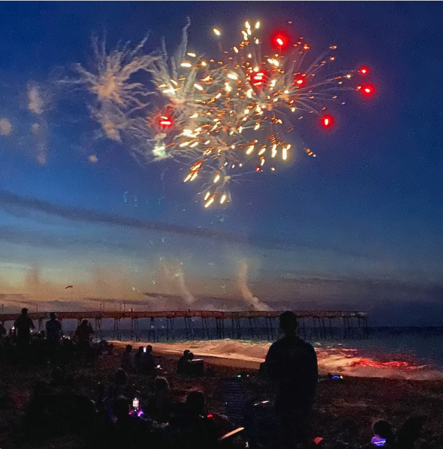 Spend the 4th of July in the Outer Banks! Check out these 2022 Kill Devil Hills firework photos. Stay at our dog-friendly 3-bedroom home &amp; walk to the beach to see the fireworks reflect on the ocean. airbnb.com/h/moonriseobx #OBX