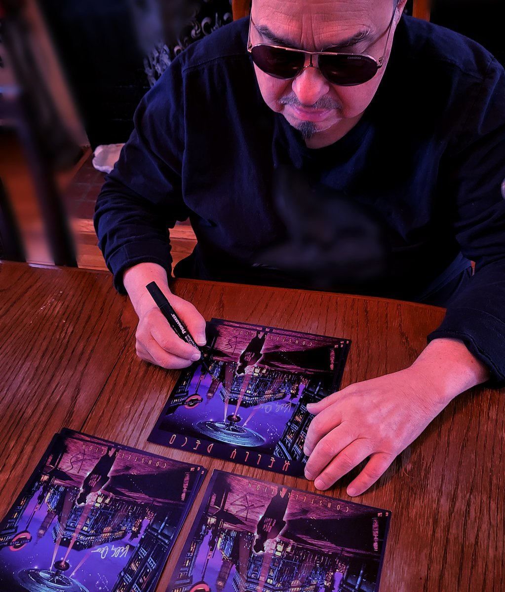 Famed artist Ioannis (Dream Theater, Deep Purple, Styx, etc....) signing his latest artwork for Deko Entertainment artist Kelly Deco.

dekoentertainment.com/kelly-deco

#IoannisArt #KellyDeco #DekoEntertainment #DreamTheater #DeepPurple #Styx #RockArt #AlbumArtwork #MusicArt