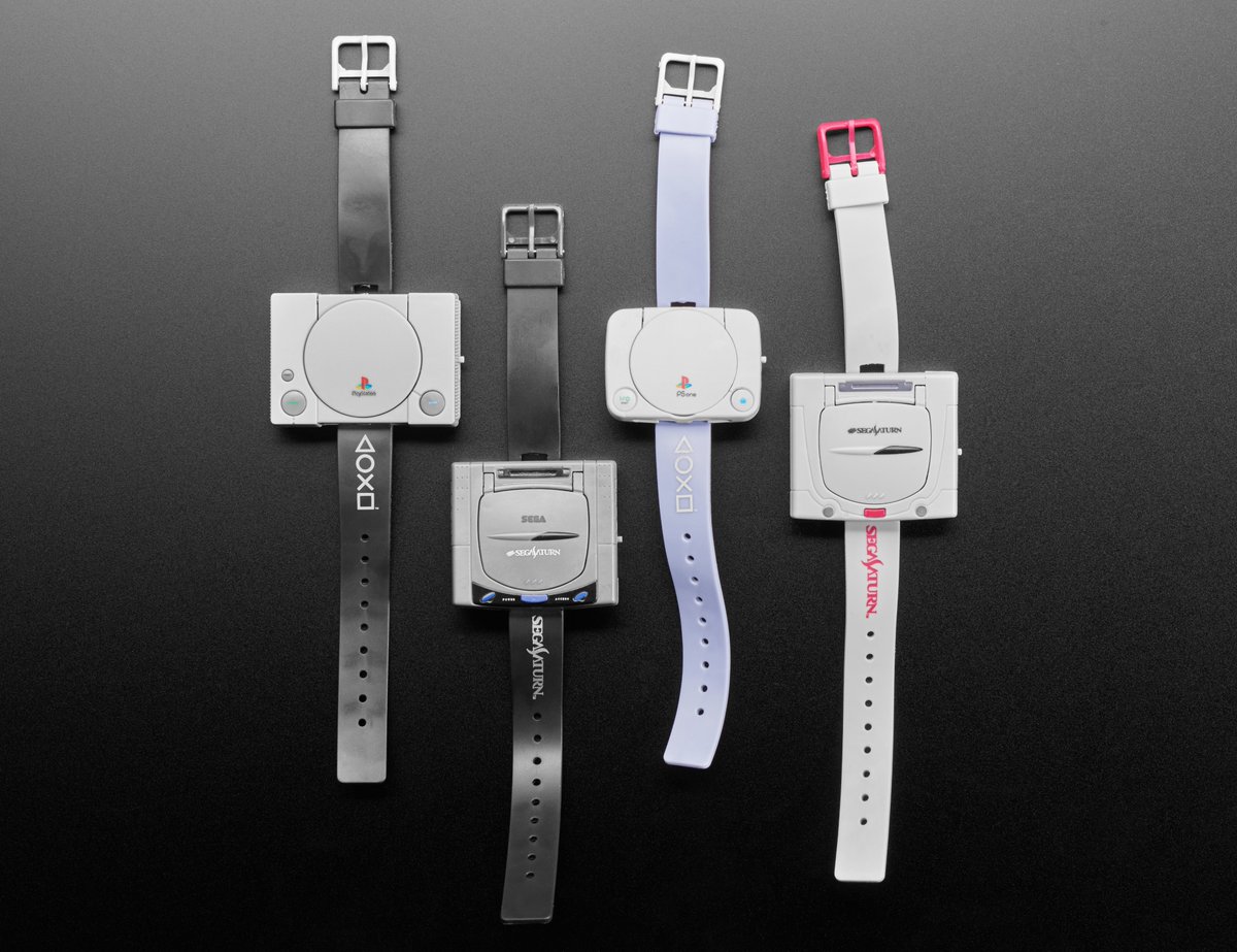 adafruit's tweet photo. Early console wars, become watches! Sony PlayStation 1 and SEGA Saturn - from Takara Tomy Arts, part of weird watches we collect! 🎮⌚🕹️🎯⏱️🕰️📀⛳🥊🌸 https://t.co/D6wClNzEtM