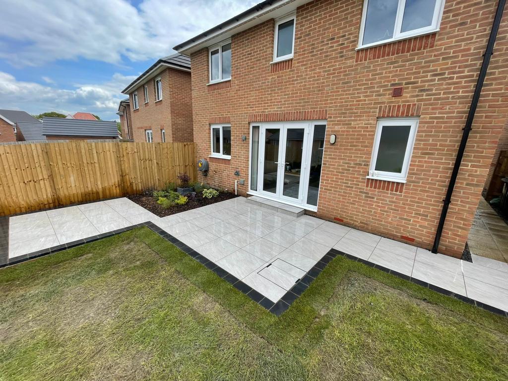easypave's tweet photo. Porcelain paving always adds a touch of class to an outdoor space. This recent project from at JS Landscapes uses Wals Grigio porcelain pavers to really transform this garden, just in time for the summer weather. 

🔗  https://t.co/rrLLfxSj5W https://t.co/LFvyLGyK0l