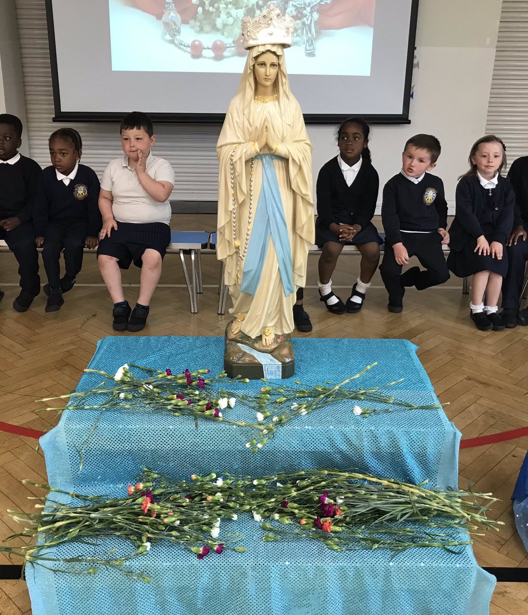 Reception led a wonderful Marian Service for the whole school today.  They crowned Mary and honoured her with beautiful flowers. #proudteachers #MaryOurMother