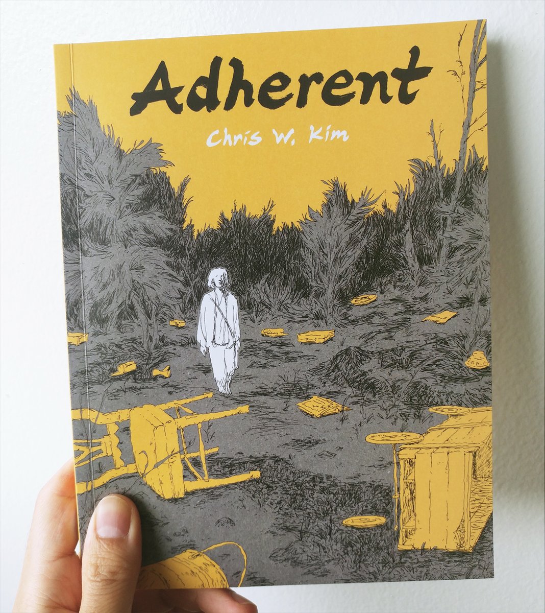 ChrisWKim's tweet photo. My new book Adherent is out this week! Thank you to Andy and Sal at @ConundrumCanada , and to Hartley for the lovely quote on the back.
Also thank you to @ONArtsCouncil for the grant that helped me to make this book https://t.co/2nnswQnpM5