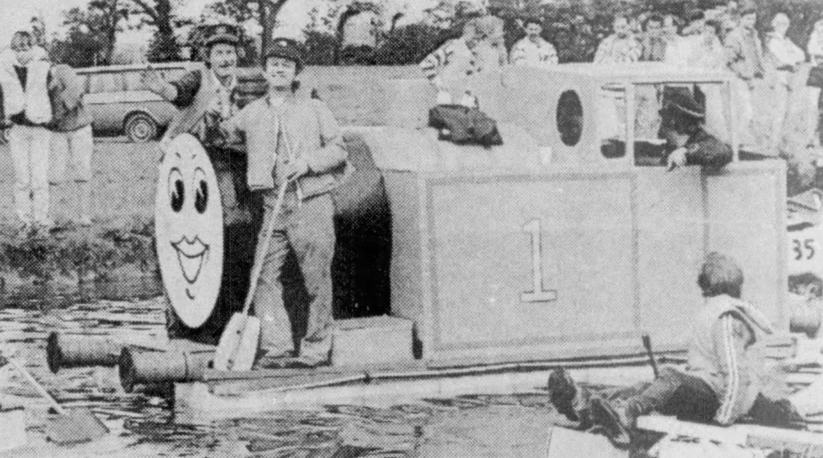 Thomas the Tank Engine rows his way down the Shropshire Union Canal during Audlem's annual raft race. 

Built by Winston Rogers, he would go on to win the fancy dress prize.

The Crewe Chronicle, July 1 1987