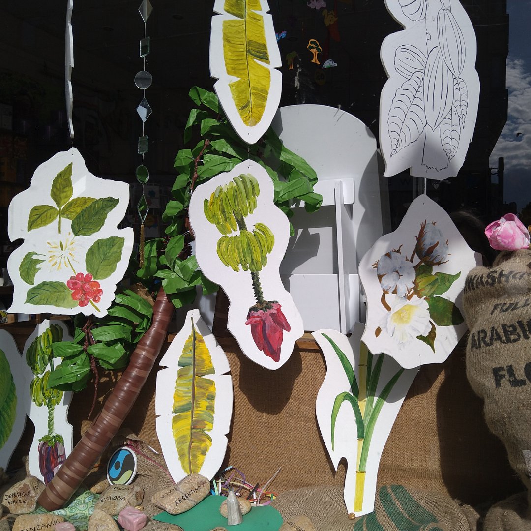 We're delighted and honoured to have Caroline and her Studio 14 art groups' work in our Rainbow Turtle window! 🎨 

The piece is called Trading Fair 🌍 

'Trading Fair' is a collaborative installation by Caroline Watson and members of her Studio 14 art groups based in Paisley.