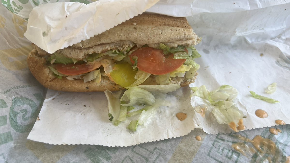 SSFU6511's tweet photo. On the road today and ordered a @SUBWAY footlong after a long time .  This is the saddest sandwich I have had in a long time.

For $17 , this thing is nasty 🤮 

#subwayfail https://t.co/L6nU17yaAL