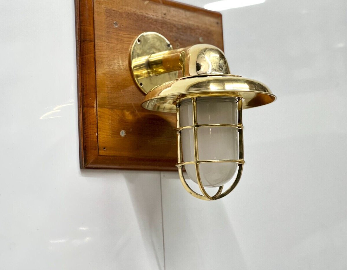 Excited to share the latest addition to my #etsy shop: Smooth Brass Outdoor Ship Bulkhead Light With Deflector Shade & White Globe etsy.me/3Mt0RGF #gold #fathersday #bedroom #artnouveau #glass #yes #milkglass #angled #walllight
