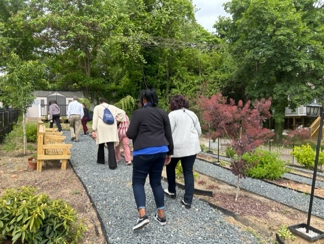 NHS and NeighborWorks staff toured rehabbed properties and visited The Urban Oasis, learning about community engagement activities. Exciting to witness our impact in action! #NHSBaltimore #NeighborWorks #PropertyRehab #CommunityEngagement #TheUrbanOasis