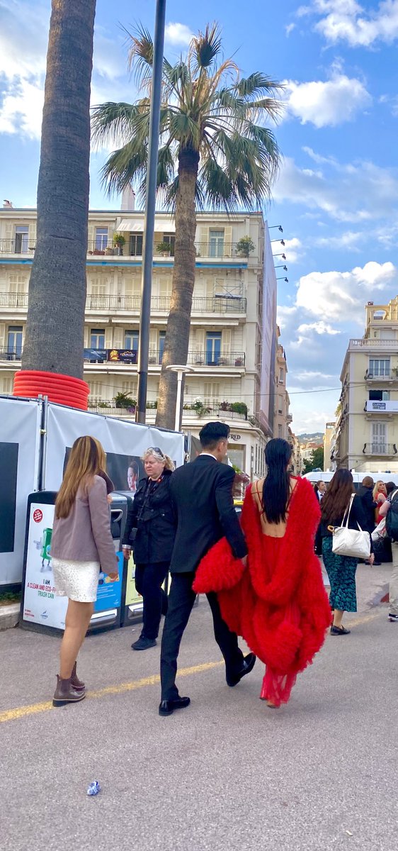 Red carpet passers by.