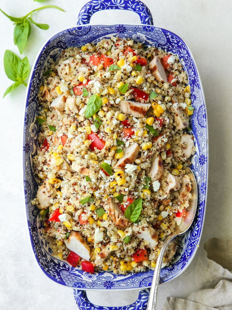 This grilled chicken quinoa salad is a one-bowl wonder of quinoa, grilled chicken and corn, red bell peppers, pine nuts, basil and feta cheese. It’s as perfect for a light meal as it is served at a summer potluck! completelydelicious.com/grilled-chicke…