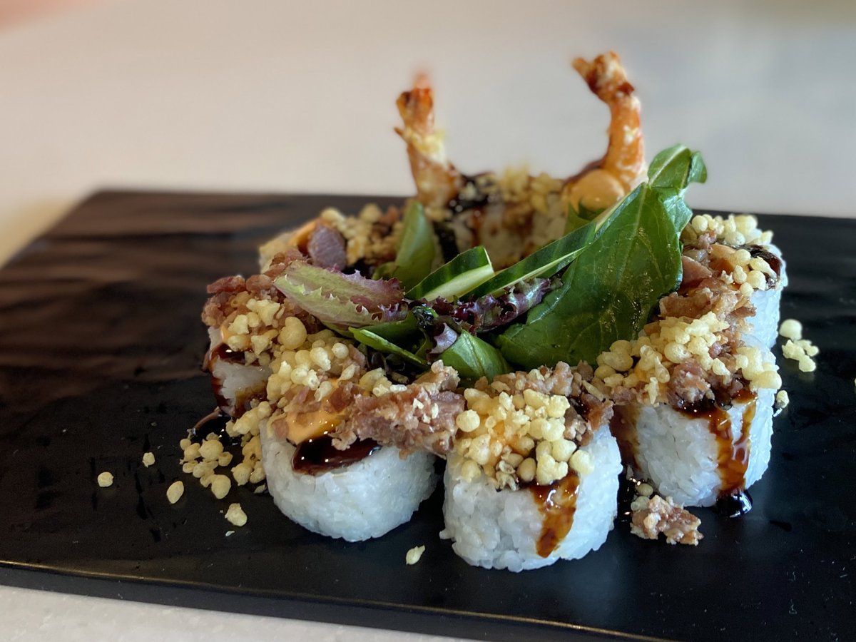 Nomzilla's tweet image. Welcome to NashVegas, where we put bacon on sushi.