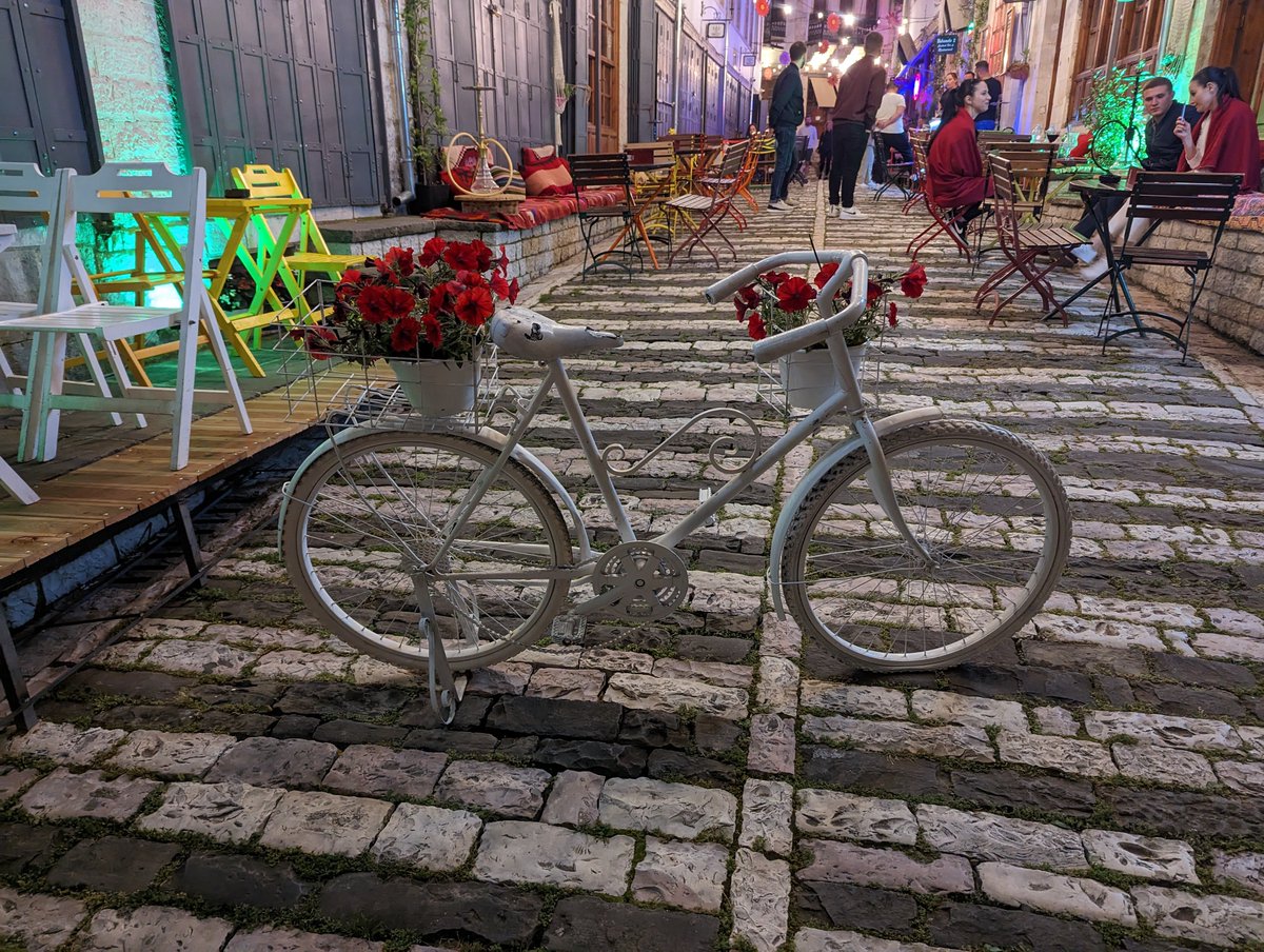 alexmoonpro's tweet photo. The bazar in Gjirokaster is closed to cars, and the roads are blocked off in a variety of creative ways. https://t.co/g8UjACRotT
