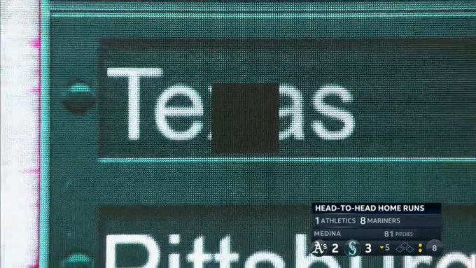 the x in “Texas” blacked out on the out of town scoreboard, where Ty’s home run ball hit