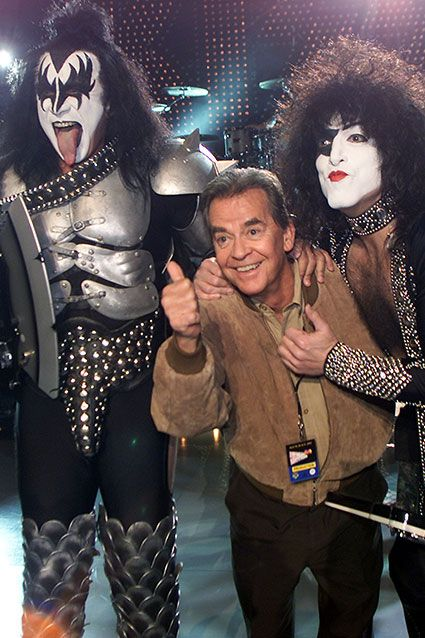 Gene Simmons and Paul Stanley with Dick Clark at a taping of American Bandstand's 50th Anniversary Celebration at the Pasadena Civic Auditorium on April 19, 2002