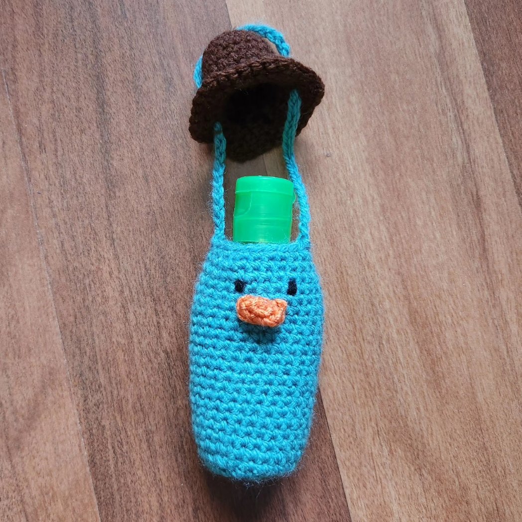 pikachuah1997's tweet photo. @DanPovenmire I made a pouch for my hand sanitiser! Perry themed of course :) #phineasandferb #perrytheplatypus https://t.co/zTGksuie4i