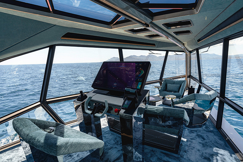 designboom's tweet photo. designboom joins holger hampf, president of @BMWDesignworks, at the cannes film festival 2023, as he reveals the luxury, electric watercraft of the future https://t.co/AKZDtBLPk2 https://t.co/FIVpdDjN9J