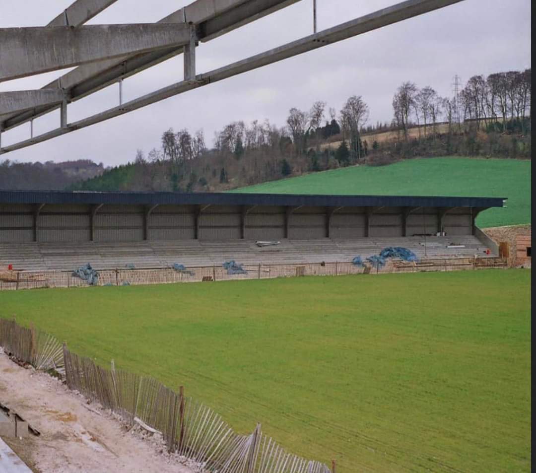 Wolfy_CES's tweet photo. This photo of an emerging #AdamsPark from Lost Football Grounds and Terraces popped up on my Facebook feed today. No Red Kites in the picture, but it is the home of @wwfcofficial. Anyone know the Year? https://t.co/cyuZxsU7B5