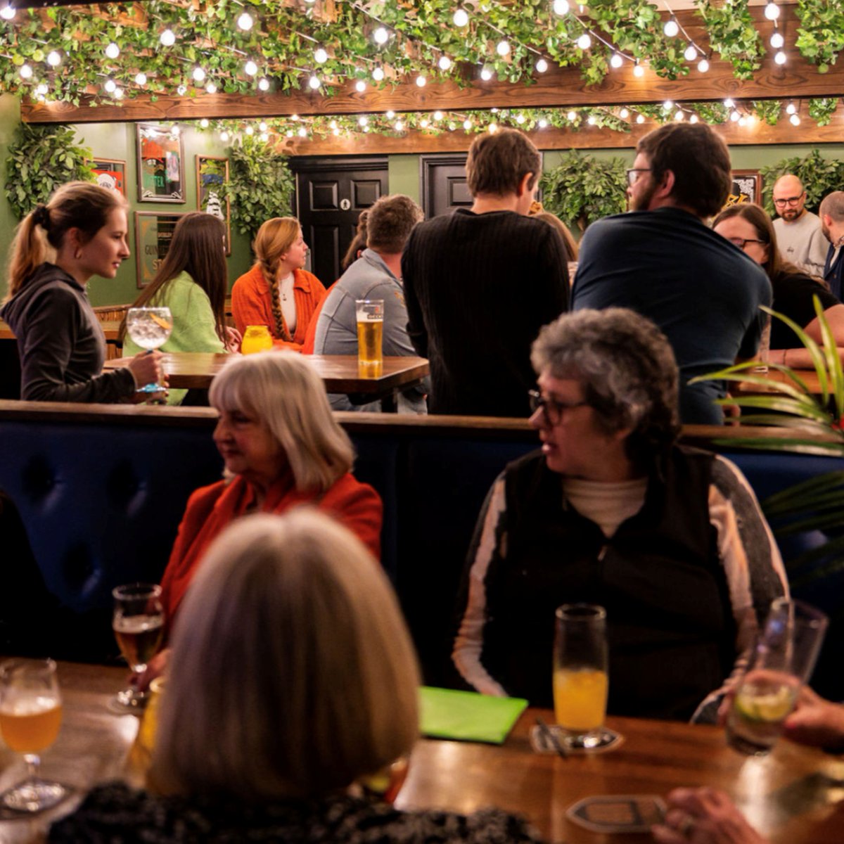 🎉 Join us for the Artwalk After Party!

📆 Wed 31 May, 20:00–Late

🕺 You're invited to a celebration of fabulous Wakefield creative talent as we're raising a glass to another great Artwalk.

[ID: A group of people are standing, sitting, and talking in the George &amp; Crown.]