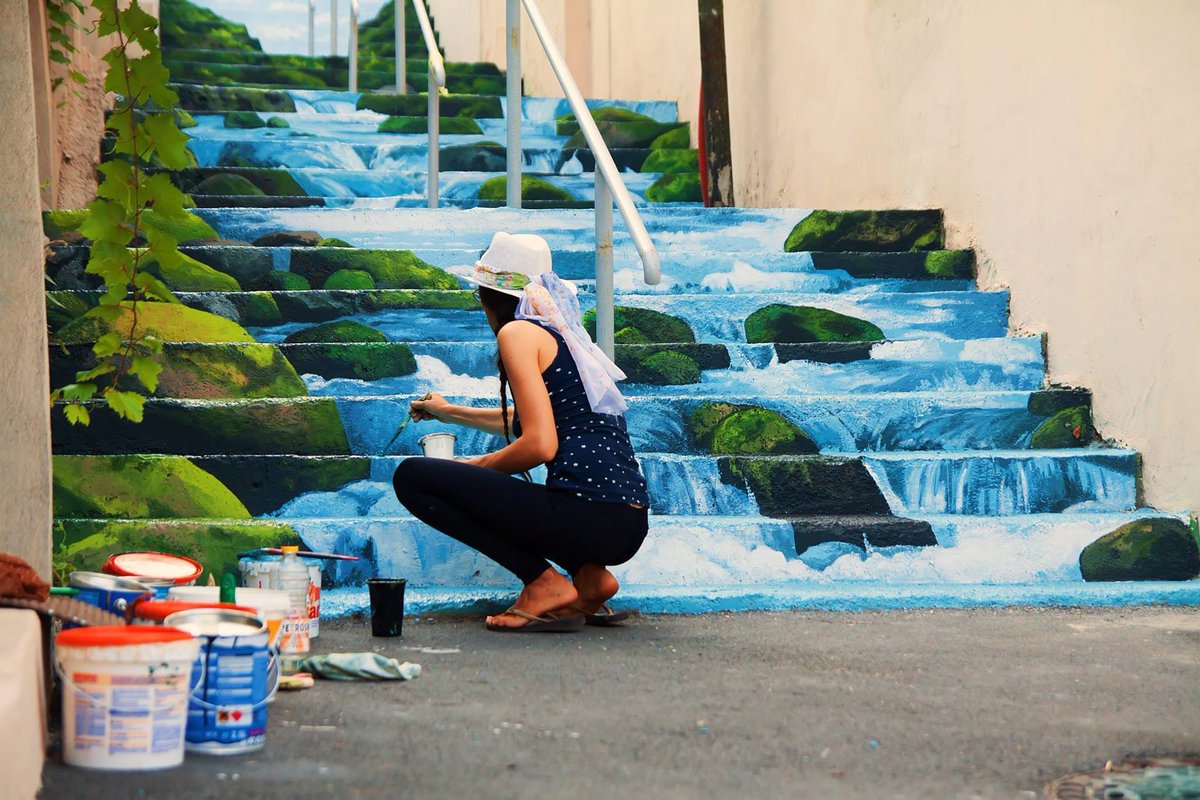 Street art stairs by Eva Radu at Xenopol Street in Bucharest, Romania