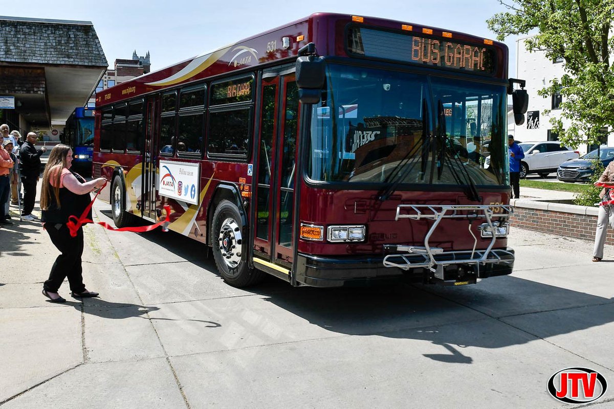 JATAtransit's tweet photo. A couple of our favorite pics from last week's Rider Appreciation Week Ribbon Cutting courtesy of @JTVJackson. Instead of scissors, we used our brand new, 35' @gilligllc bus to cut the ribbon.
#jacksonmi #publictransportation #chambersofcommerce #ribboncutting #giantscissors https://t.co/kTbS1prw0a