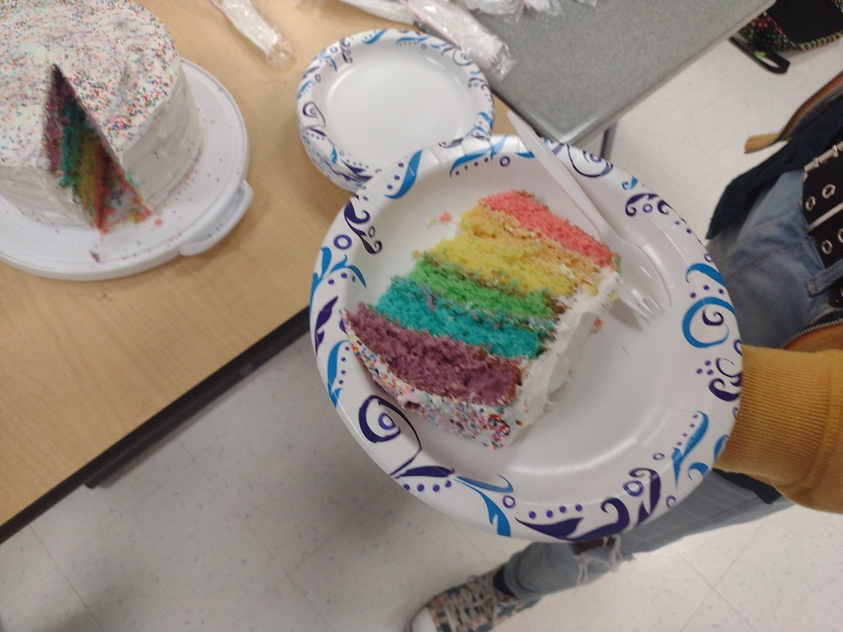 SScottWhitaker's tweet photo. @SpeakUpPHS challenged @MrBPsychology to make a layered rainbow cake to celebrate seniors graduating, needless to say he made two! https://t.co/4QuLxrvGgy