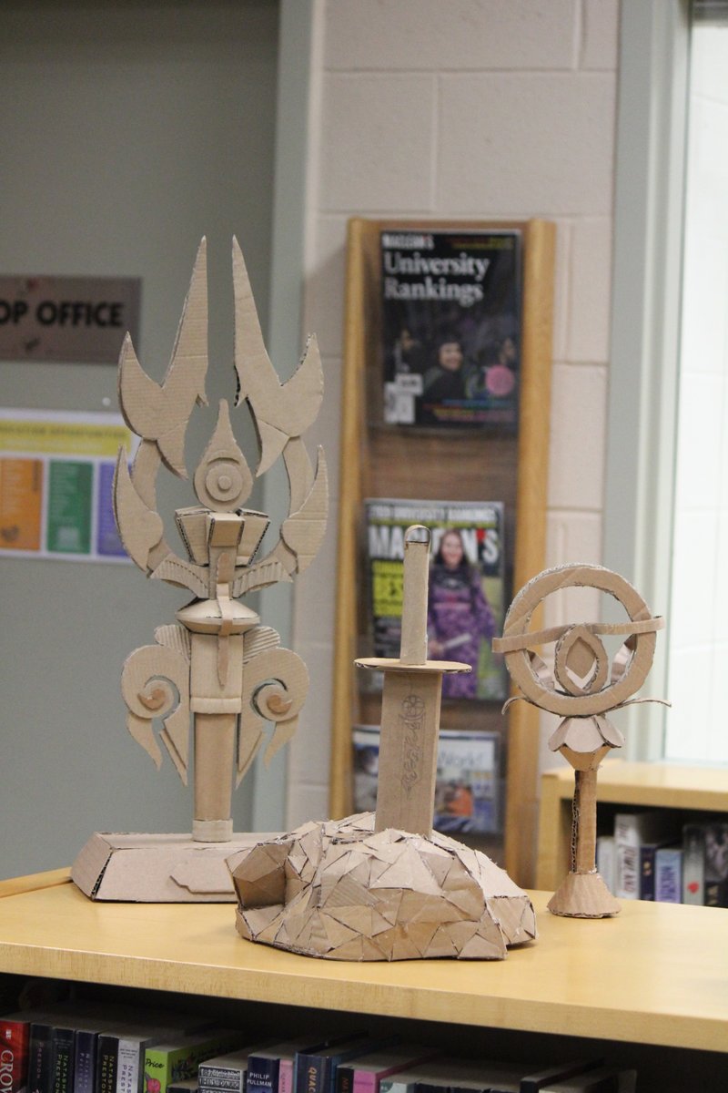 pethslibrary's tweet photo. Please visit the @trudeauhs Library to view the intricate #cardboardsculptures created by Mr. Meyer's #mediaarts class! https://t.co/2UNtFAMqti