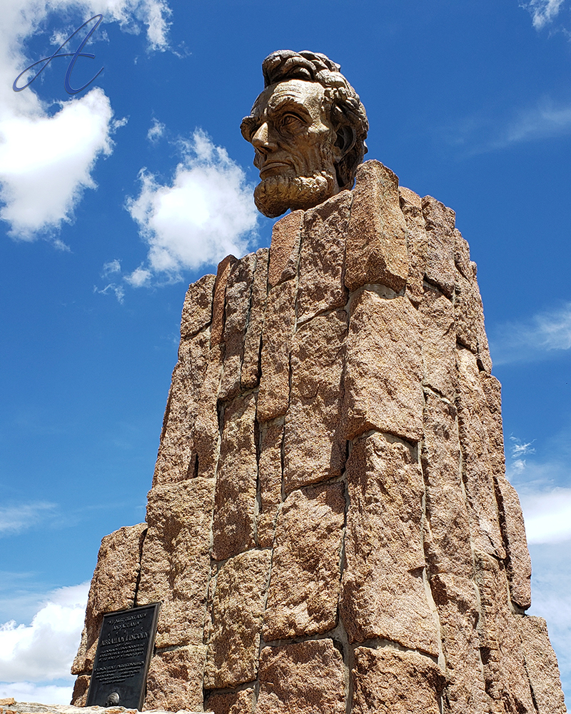 ArtizenP's tweet photo. Why WYO: While going West on I-80 from Cheyenne, you've likely seen old Abe judging your driving. Lincoln was first built in 59' on the summit of the Lincoln Highway. He was moved to his perch on I-80 in 69'. His craggy features reflecting the mountains.
#WhyWyo #AbeLincoln #I-80 https://t.co/xE5XLJUUUI