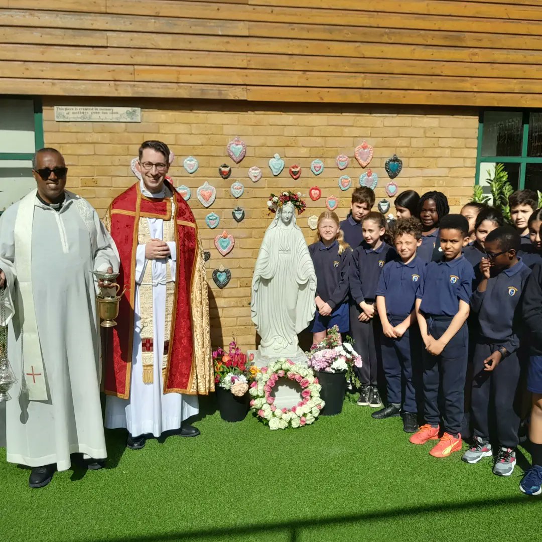 The school community enjoyed a wonderful May Procession this morning. Thank you for the lovely flowers! Fr. Matthew also blessed the new statue of Mary in the memorial garden.