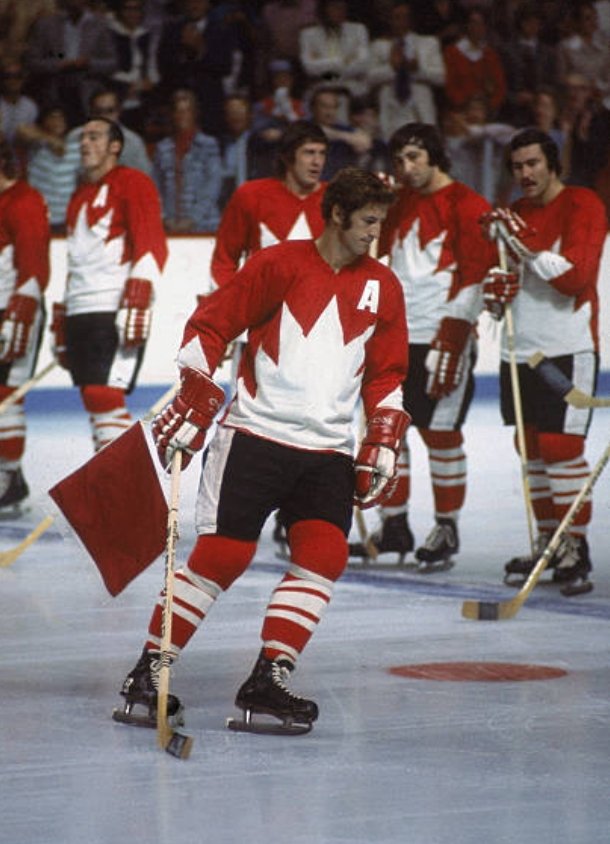 ThrillVictory's tweet photo. Jean Ratelle of Team Canada being introduced during the 1972 Summit Series. Behind him are Frank Mahovlich, Don Awrey, Guy Lapointe and Mickey Redmond. #JeanRatelle #FrankMahovlich #DonAwrey #GuyLapointe #MickeyRedmond #hockey #SummitSeries #Canada #1970s #70s https://t.co/NvBrdNtqi8