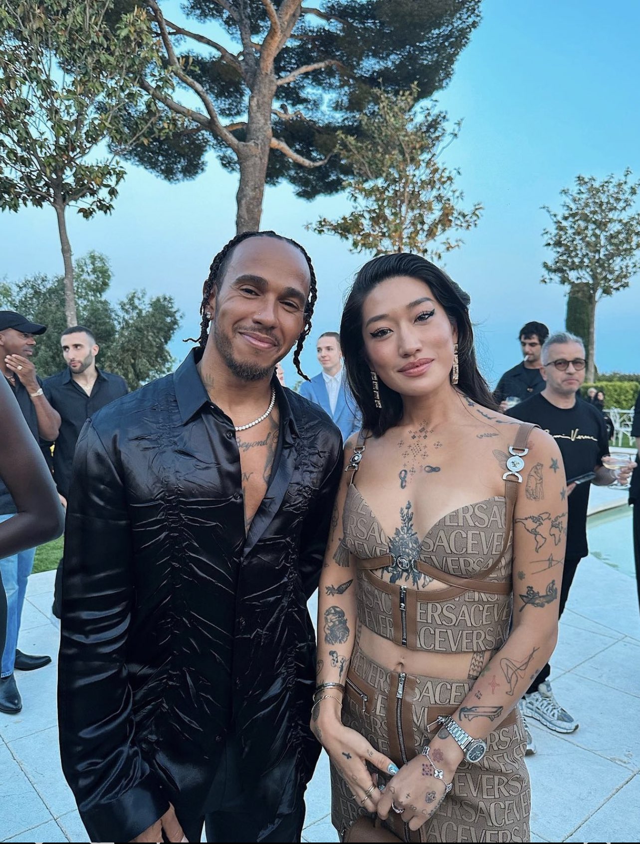 Outlander Magazine on X: Lewis Hamilton and Peggy Gou at Versace