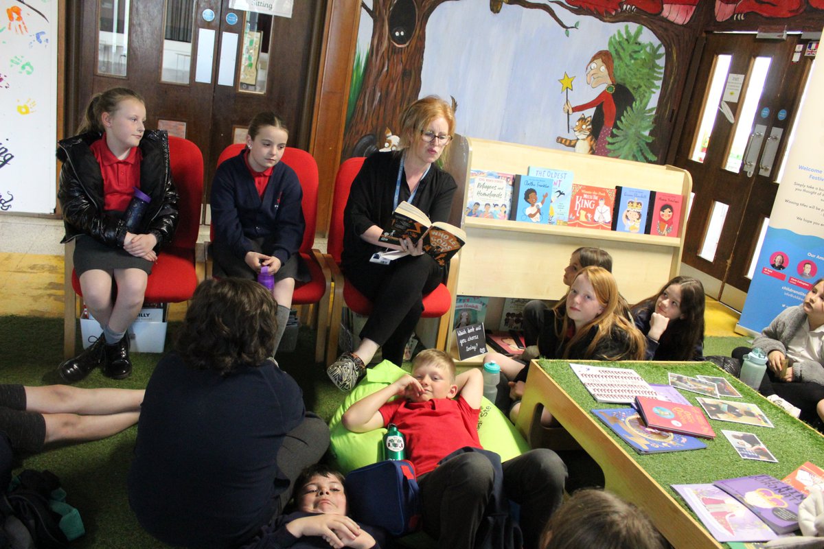 DEAR (Drop everything and read) with Year 5 in the library yesterday, listening to an animated Mrs O'Loughlin reading a story #shinelikestars #Dear #ourwonderfulschool #starreaders