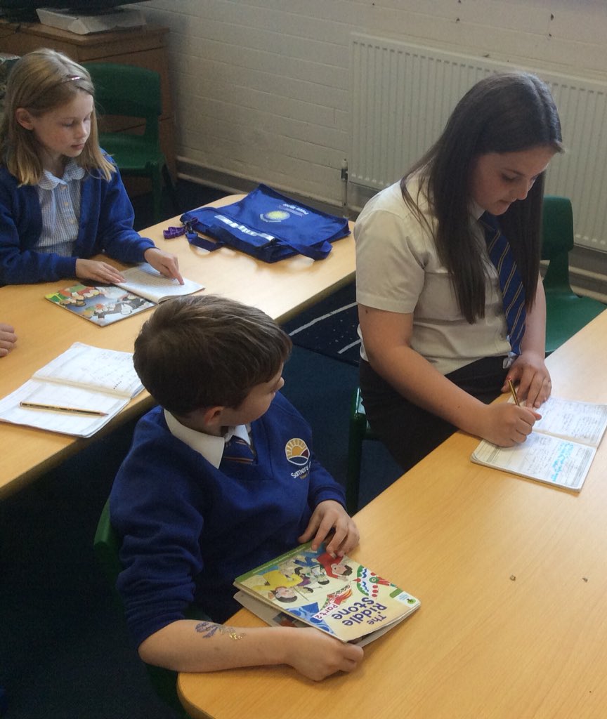 Reading with our Year 6 friends!