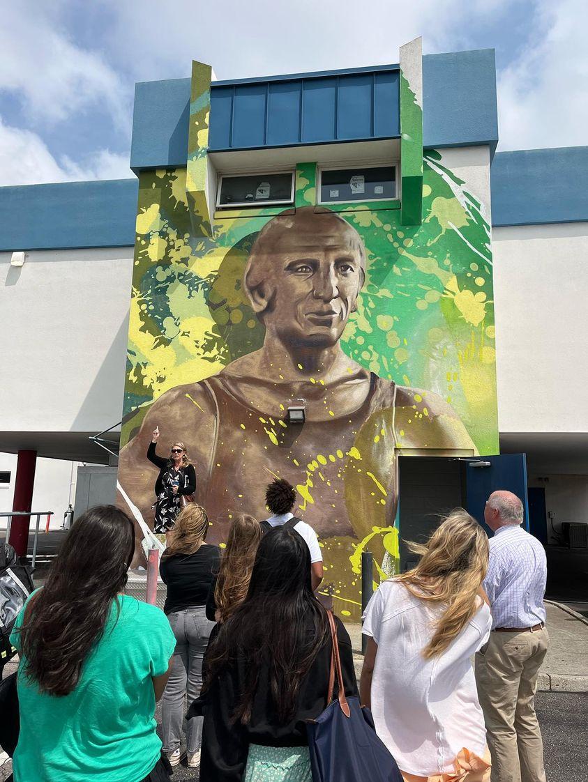 Did you know that the ViBe nonprofit tours countless school groups and community organizations through Virginia Beach's arts district all year long? Join in a free public tour every First Friday at 6pm or Second Saturday at 10am. Pictured: mural by Arcy for Wareings Gym.