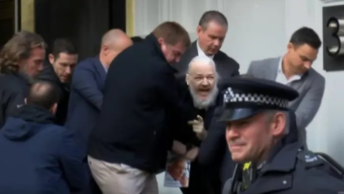 Snowden's tweet image. Julian Assange is a political prisoner.