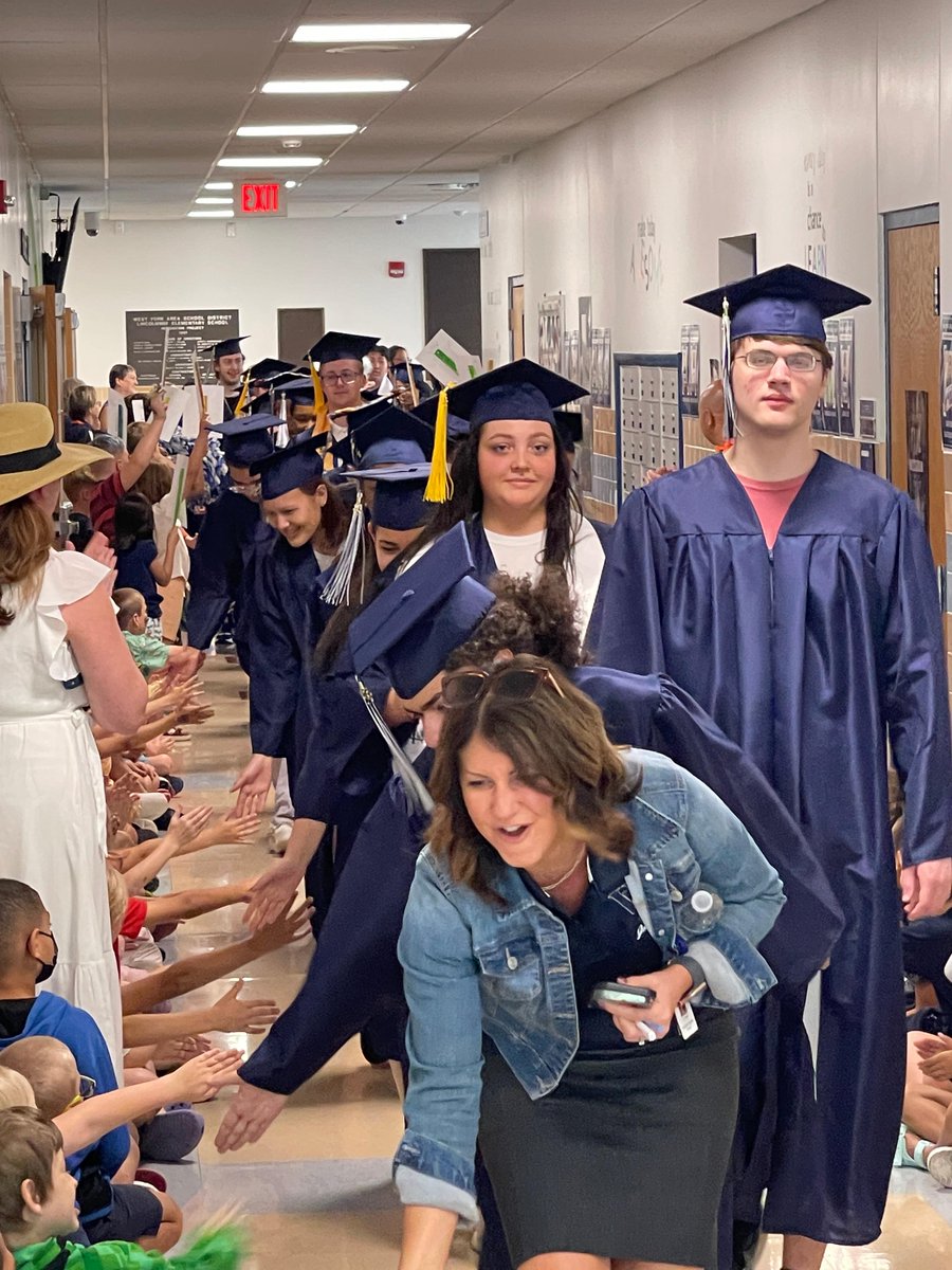 wyasdblue's tweet photo. "Grad Walk!" Day!  Our elementary and middle school students lined their hallways, offering congratuations, high-5s, hugs, and smiles of admiration as the graduates paraded down each hallway.  CONGRATULATIONS, CLASS OF 2023!
#wyproud #wyasd #awesomestartshere
@WYASDSupt https://t.co/Os2qqUpbvz