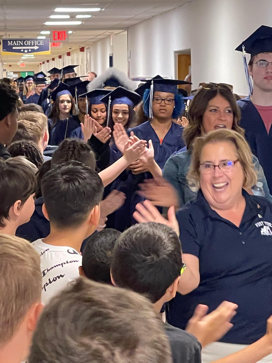 wyasdblue's tweet photo. "Grad Walk!" Day!  Our elementary and middle school students lined their hallways, offering congratuations, high-5s, hugs, and smiles of admiration as the graduates paraded down each hallway.  CONGRATULATIONS, CLASS OF 2023!
#wyproud #wyasd #awesomestartshere
@WYASDSupt https://t.co/Os2qqUpbvz