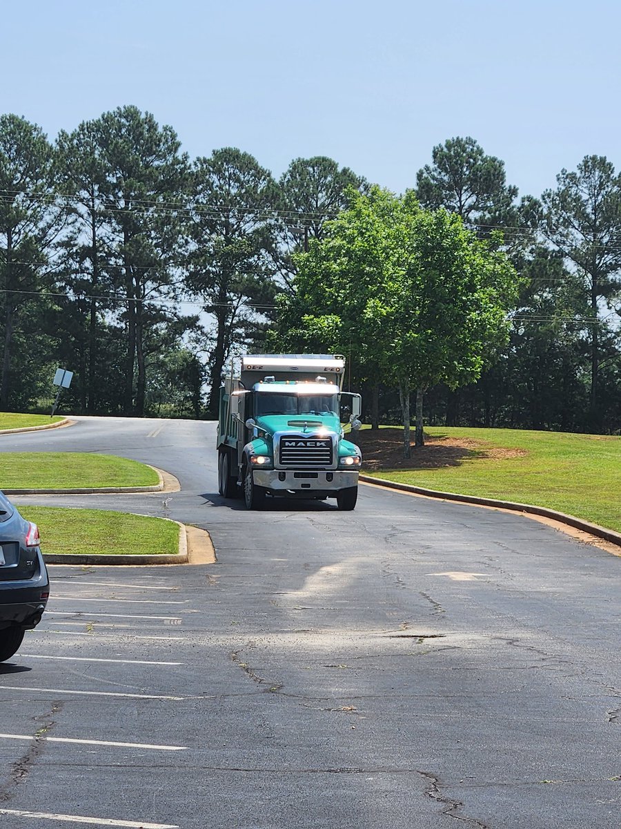 TheJenJMartin's tweet photo. I have never been so excited to see a dump track! The new & improved Wildcat Walkway coming soon for our students, staff, & community! #WellnessHCS @FredricLatschar @hfemiway https://t.co/yCVo5sgc2a
