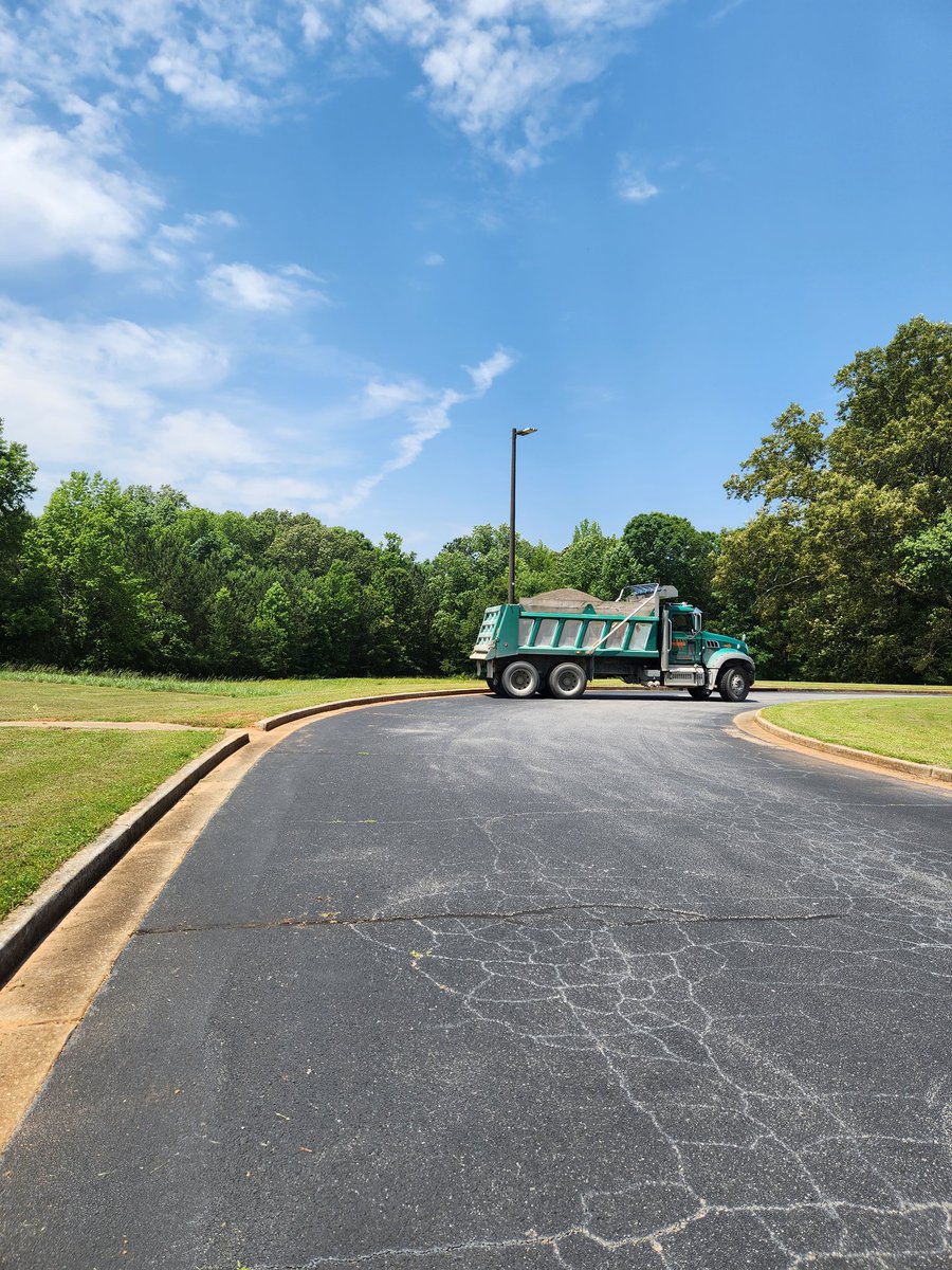 TheJenJMartin's tweet photo. I have never been so excited to see a dump track! The new & improved Wildcat Walkway coming soon for our students, staff, & community! #WellnessHCS @FredricLatschar @hfemiway https://t.co/yCVo5sgc2a