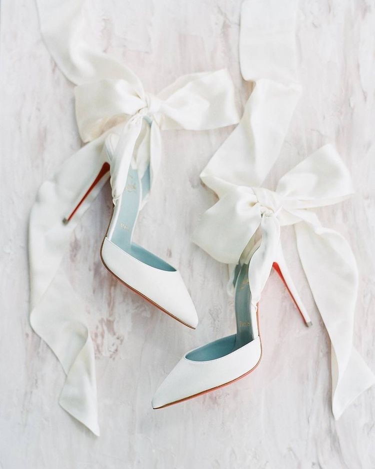 Bridal shoes are a must! Don't forget to bring them to all of your alterations appointments so that the length of your fabulous dress can be altered!⁠
⁠
#alterations #fittings #wedding #bridetobe #weddingshoes #ivory #bow #bride #engaged #newcastle