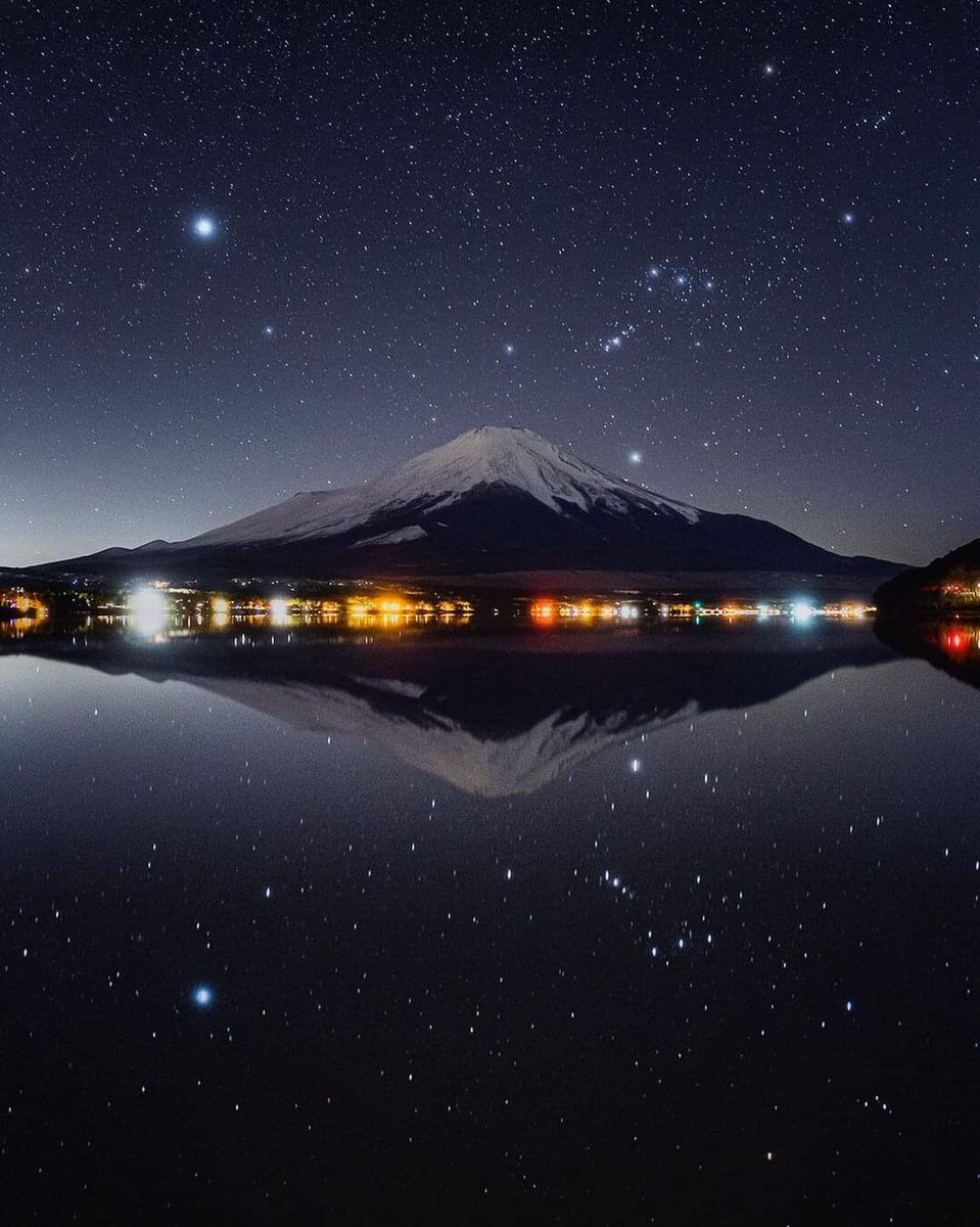 Star Sirius and Orion Constellation over Mt. Fuji