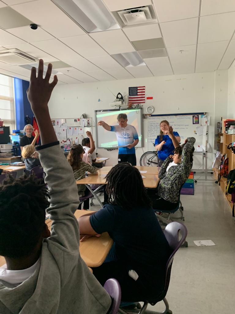 PolishEmbassyUS's tweet photo. Another episode of the #EmbassyAdoptionProgram at Payne Elementary School is in the books! This time the 5th graders hosted a very special guest @Leszek33 – spiritus movens (literally!) of #WorldBicycleDay ! The students learned how to ride bikes safely! See you on the trails! 🚵♀️ https://t.co/VuucfPtmu7