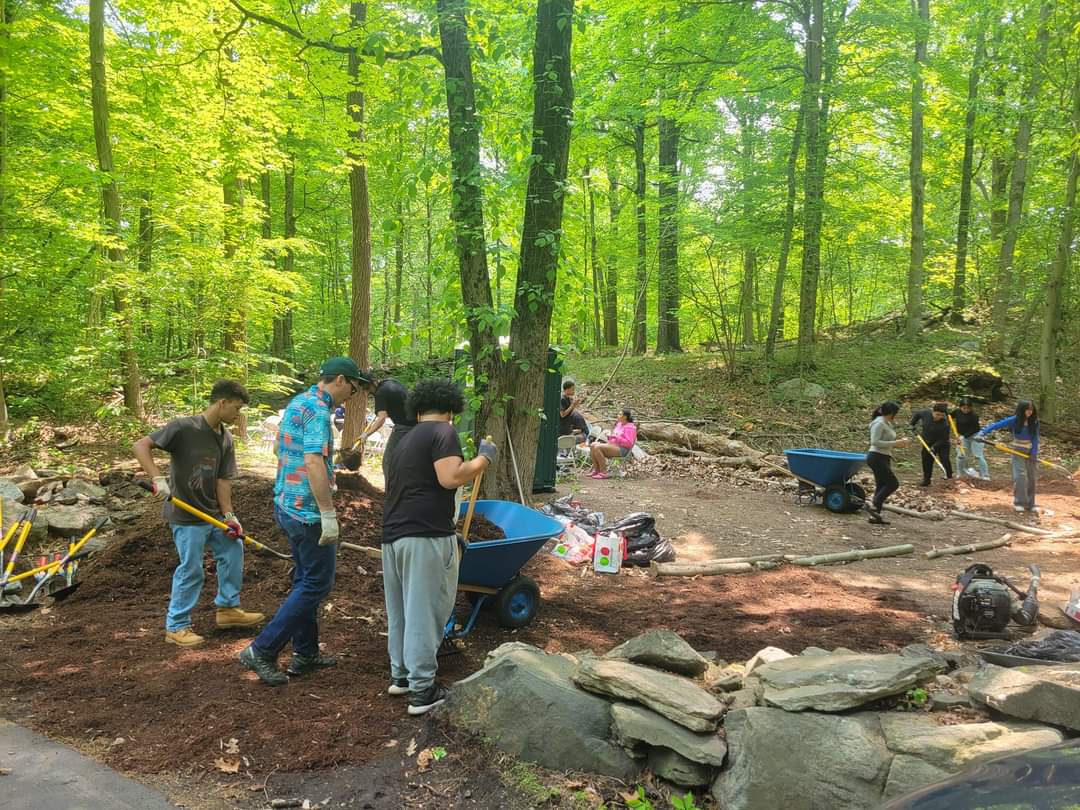 Rochambeau students ROCK as they spend their day cleaning up the Stoney Hill Cemetery under the leadership of Social Studies teacher, Eliseo Lugo.