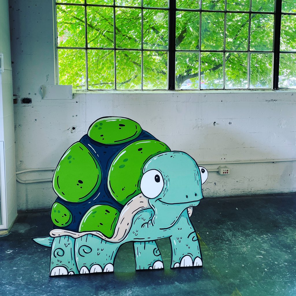 Came into joyful HQ today to see that we received a special delivery of Terrance The Turtle from our neighbor @MikeBennettArt