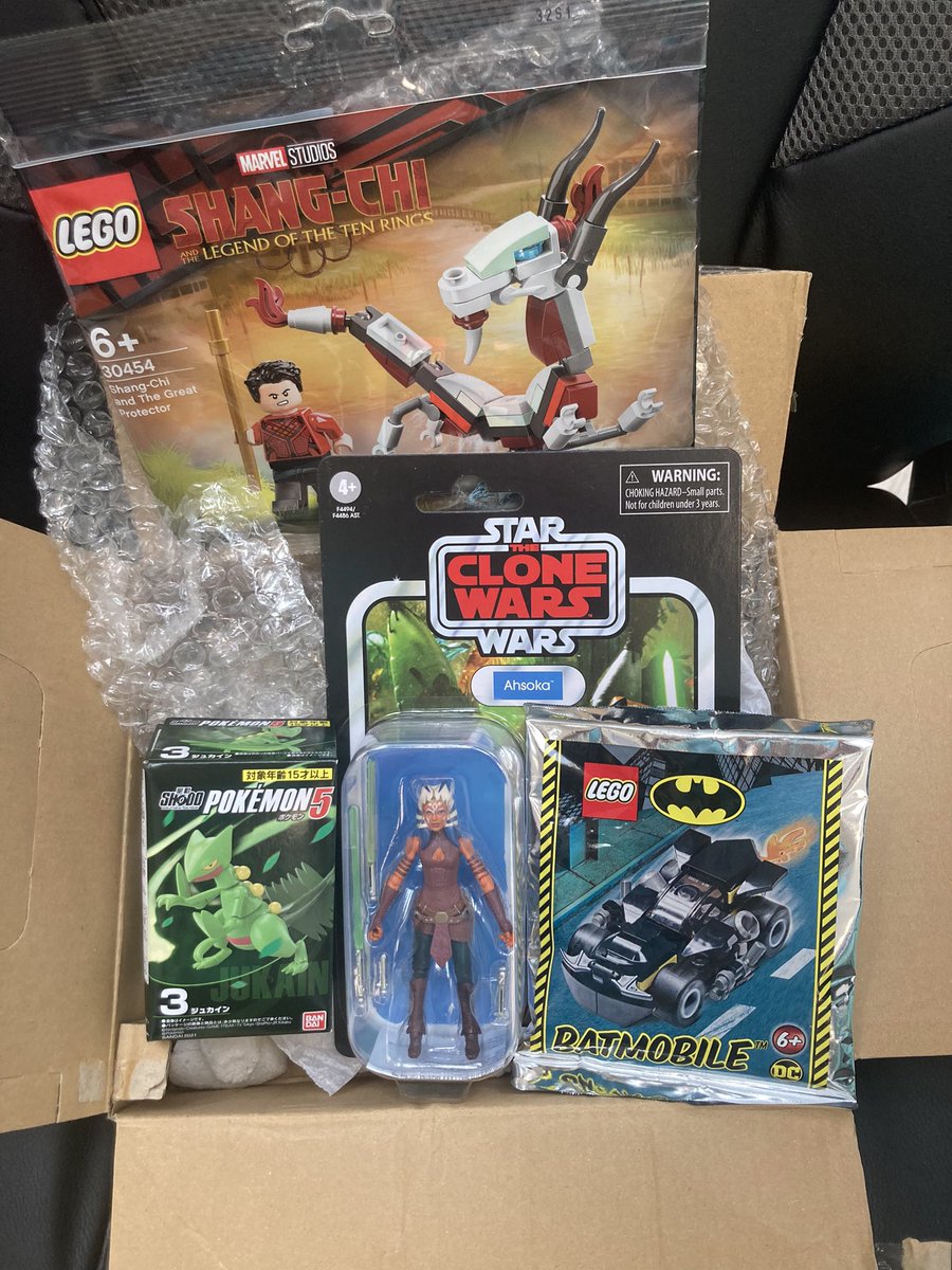 TheRealBuettner's tweet photo. Thanks @camartsbiz for this awesome care package full of collectible figures! Super excited about the Ashoka figure from Star Wars! Also pumped about the Lego and Pokémon toys too! https://t.co/UeYhdXh8Nh