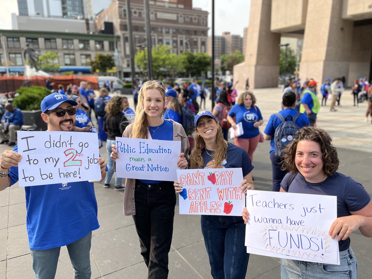 UFT's tweet photo. Teachers can’t pay rent 💰 with apples 🍎. Manhattan educators demand a #uftfaircontractnow https://t.co/p6Z9LIwTb0