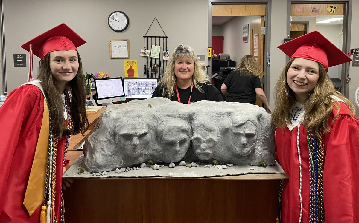 NPEMrsFosnow's tweet photo. If you’ve been to NPE you’ve probably noticed our Mt. Rushmore by the flag.  Today our former NPE artists are graduating.  We are so lucky to have Mrs. Boucher still bringing out the best in our students. ❤️🇺🇸 https://t.co/DJmyIgzNt1
