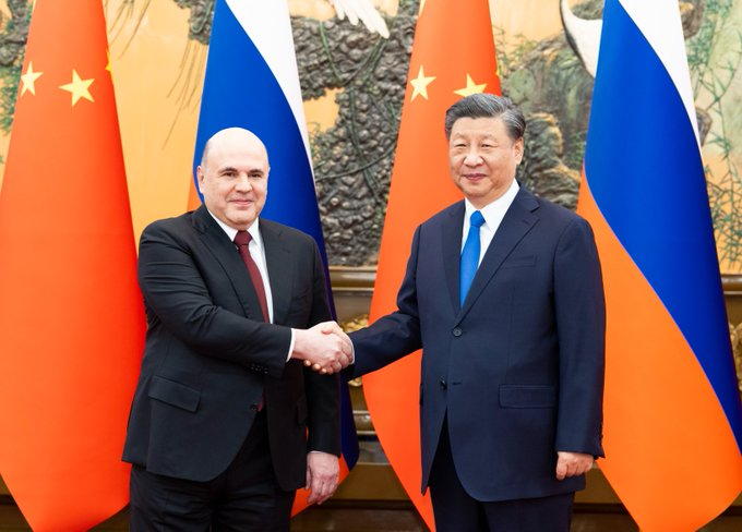 the_waring's tweet photo. President Xi Jinping just met with Russian PM Mikhail Mishustin. President Xi said cementing and ensuring the sound growth of China-Russia relations is not only what the people want but also the trend of the times. https://t.co/Kfd4PWcWNd