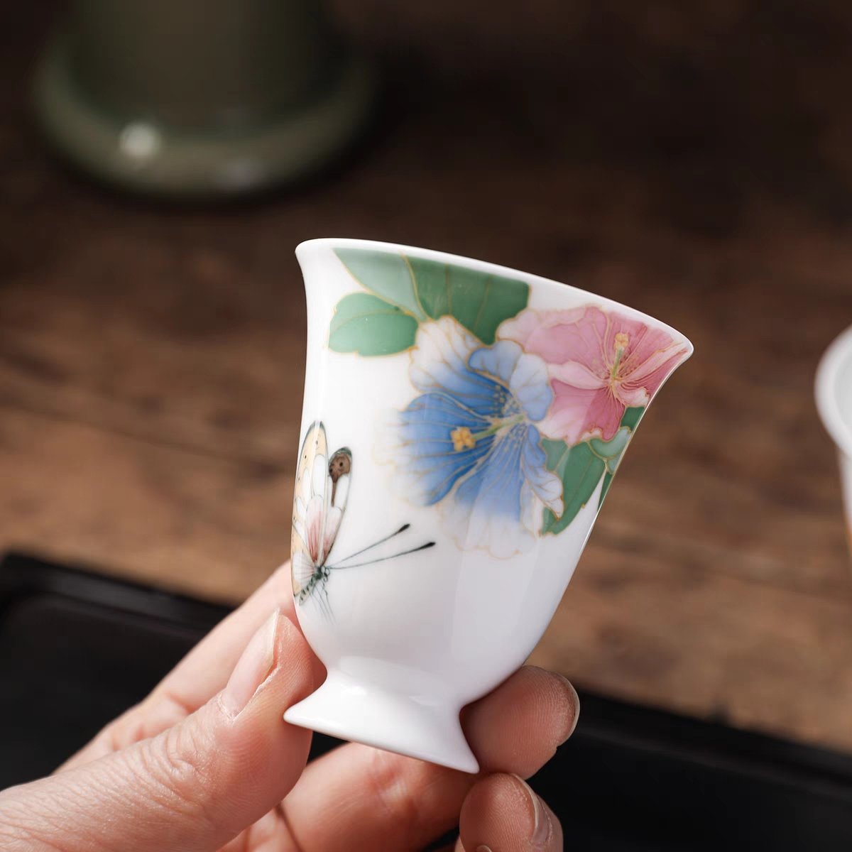 zingpottery's tweet photo. Fluttering with excitement over this beautiful butterfly-patterned teacup! Sipping my tea just got a whole lot fancier thanks to this kung fu cup made with underglaze porcelain.

#chineseteaware #tealover #teaeveryday #timefortea
#teatime #butterflycup 
#lilingporcelain https://t.co/xkJN9YfLUW