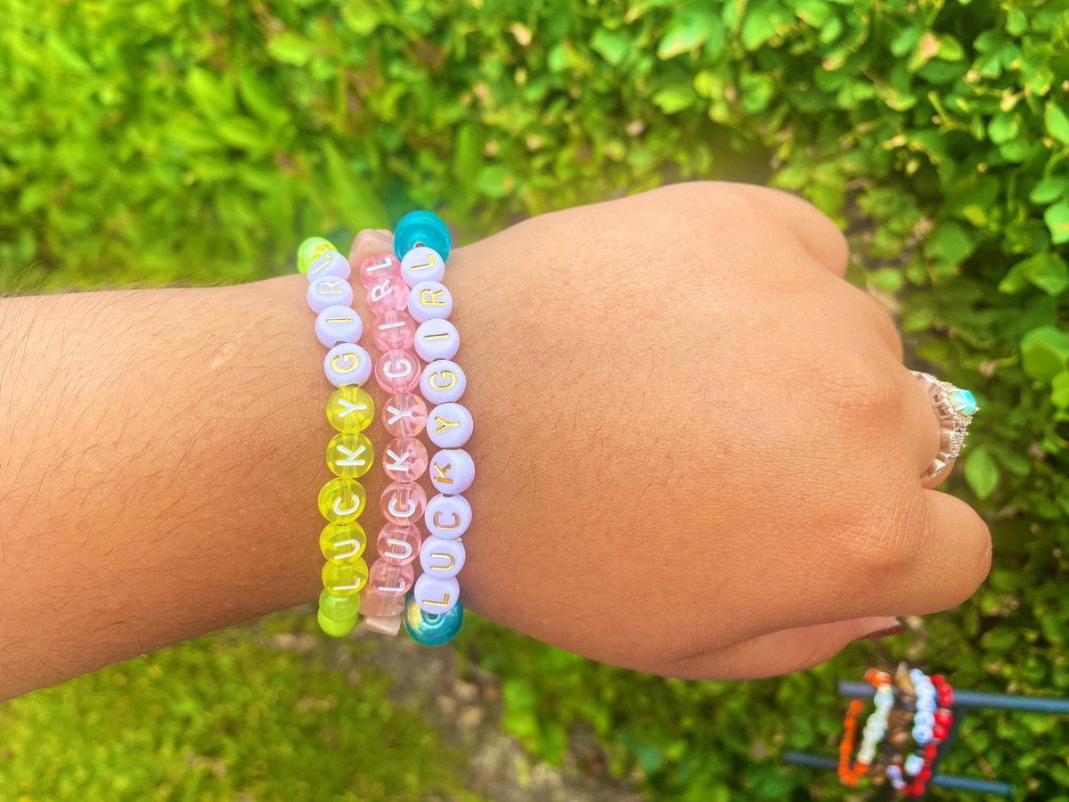 celestialtings's tweet photo. I could never take cute bracelet pics, but here’s some “Lucky Girl” bracelets I’ll be dropping soon. My fave is the chonky blue one 🩵 https://t.co/wkWUqrsAmq